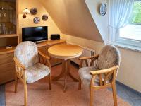 TV a/nebo společenská místnost v ubytování Haus *Üüs Aran* Wohnung Nr. 6