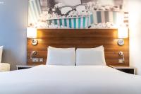 Heeton Concept Hotel - City Centre Liverpoolにあるベッド