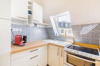 Kuchnia lub aneks kuchenny w obiekcie Lovely apartment Paris Saint-Lazare Opéra