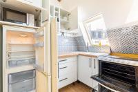 Kuchnia lub aneks kuchenny w obiekcie Lovely apartment Paris Saint-Lazare Opéra