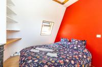 Łóżko lub łóżka w pokoju w obiekcie Lovely apartment Paris Saint-Lazare Opéra