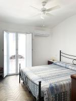 A bed or beds in a room at Casa Vacanze Magnolia 42 Calitri