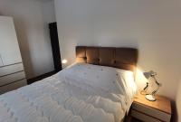 Posteľ alebo postele v izbe v ubytovaní Apartman Villa Adrijana