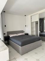 Postel nebo postele na pokoji v ubytování J&M Apartment Miraflores La Cala