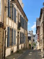 an alley in an old town with buildings at Ty Kaz Old Kemper in Quimper