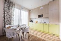 Kuchyňa alebo kuchynka v ubytovaní Bursztynowe Tarasy - Apartamenty