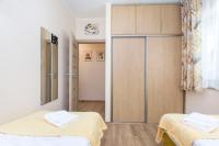Posteľ alebo postele v izbe v ubytovaní Bursztynowe Tarasy - Apartamenty