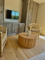 Televízia a/alebo spoločenská miestnosť v ubytovaní La Maison d'Ambrine - La Villa Ibiza