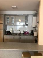 Kuchyň nebo kuchyňský kout v ubytování APARTAMENTO A 50 METROS DE LA PLAYA DE SILGAR