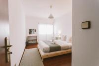 Postel nebo postele na pokoji v ubytování Best Houses 75 - Aurora Apartment