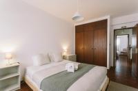 Postel nebo postele na pokoji v ubytování Best Houses 75 - Aurora Apartment