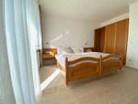 Postel nebo postele na pokoji v ubytování Unsereins Hotel