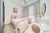 Postel nebo postele na pokoji v ubytování Harmonious 2BR with Assistant Room at Mesk 1 Midtown Dubai Production City by Deluxe Holiday Homes