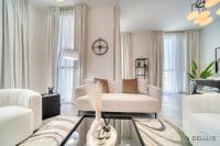 Posezení v ubytování Harmonious 2BR with Assistant Room at Mesk 1 Midtown Dubai Production City by Deluxe Holiday Homes