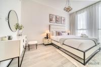 Postel nebo postele na pokoji v ubytování Harmonious 2BR with Assistant Room at Mesk 1 Midtown Dubai Production City by Deluxe Holiday Homes