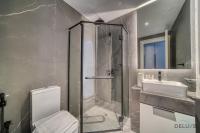 Koupelna v ubytování Harmonious 2BR with Assistant Room at Mesk 1 Midtown Dubai Production City by Deluxe Holiday Homes