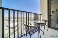 Balkón nebo terasa v ubytování Harmonious 2BR with Assistant Room at Mesk 1 Midtown Dubai Production City by Deluxe Holiday Homes