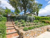 A garden outside Apartment Nuvola by Interhome
