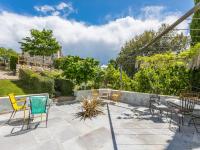 A garden outside Apartment Nuvola by Interhome