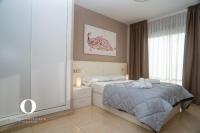 Posteľ alebo postele v izbe v ubytovaní Holiday Deluxe Apartment Miramar Magic World
