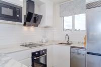 Kuchyňa alebo kuchynka v ubytovaní Don Pepe Chic Apartment by Rock Rentals