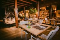 a dining room with a table and chairs at NANNAI Noronha in Fernando de Noronha