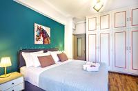 Posteľ alebo postele v izbe v ubytovaní Ionian Citizen Suite