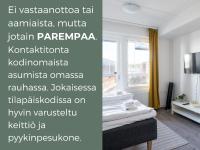 Postel nebo postele na pokoji v ubytování Hiisi Homes Kirkkonummi Masala Seppä-Kallen kuja