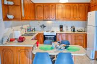 A kitchen or kitchenette at Armonia