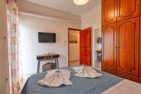 A bed or beds in a room at Armonia