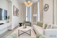 Posezení v ubytování Suave 2BR with Assistant Room at Mesk 1 Midtown Dubai Production City by Deluxe Holiday Homes