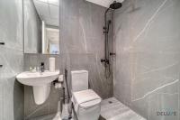 Koupelna v ubytování Suave 2BR with Assistant Room at Mesk 1 Midtown Dubai Production City by Deluxe Holiday Homes