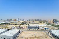 Nespecifikovaný výhled na destinaci Dubaj nebo výhled na město při pohledu z apartmánu