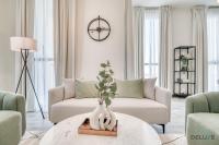 Posezení v ubytování Suave 2BR with Assistant Room at Mesk 1 Midtown Dubai Production City by Deluxe Holiday Homes