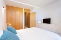 TV a/nebo společenská místnost v ubytování Home2Book Cozy Apt Santa Úrsula, Sea Views & Pool
