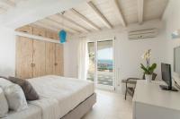Posteľ alebo postele v izbe v ubytovaní Villa Alitis by Mykonos Rocks