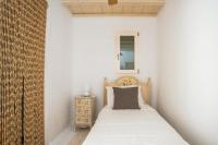 Posteľ alebo postele v izbe v ubytovaní Villa Alitis by Mykonos Rocks