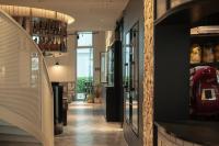 a tasting room with a bar and a hallway at the breeze in Ahlbeck