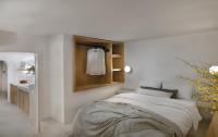 A bed or beds in a room at VLIA Mykonos