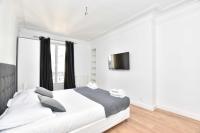 Ein Bett oder Betten in einem Zimmer der Unterkunft Lovely flat 4 P Palais Royal - Mus&eacute;e du Louvre