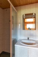 a bathroom with a sink and a shower at Chalet Le Lapye in Les Gets