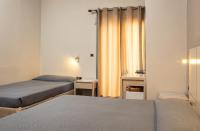 Postel nebo postele na pokoji v ubytování Plaza Hotel