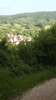 a view of a village from the top of a hill at Les chambres de Blanot in Blanot