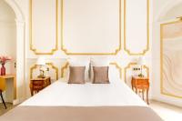 Ein Bett oder Betten in einem Zimmer der Unterkunft Luxury 4 bedroom 4 bathroom Apartment - Louvre