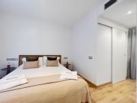 A bed or beds in a room at Stay U-nique Apartments Urquinaona II