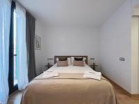 A bed or beds in a room at Stay U-nique Apartments Urquinaona II