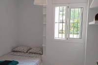 Postel nebo postele na pokoji v ubytování Excellent choice for up to 8, 150 sqm of comfort, 700 to beach, with pool, air-conditioning