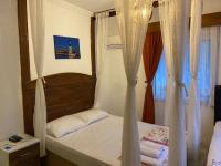 Postel nebo postele na pokoji v ubytování Bonjourla Otel