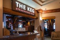 a restaurant with a sign that reads the keg steak house at Banff Caribou Lodge and Spa in Banff