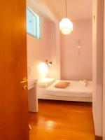 Ein Bett oder Betten in einem Zimmer der Unterkunft Grimaldi Centrale 5 Pers Wi-Fi AC